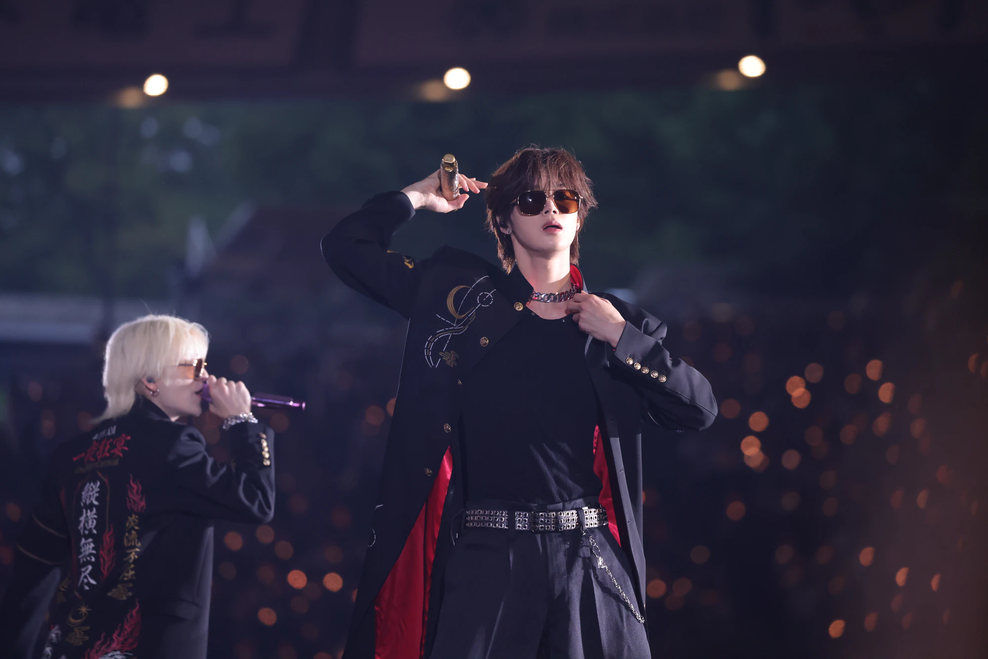 K performing on stage during a live performance.