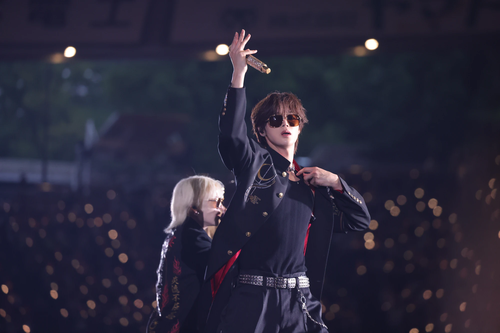 K performing on stage during a live performance.