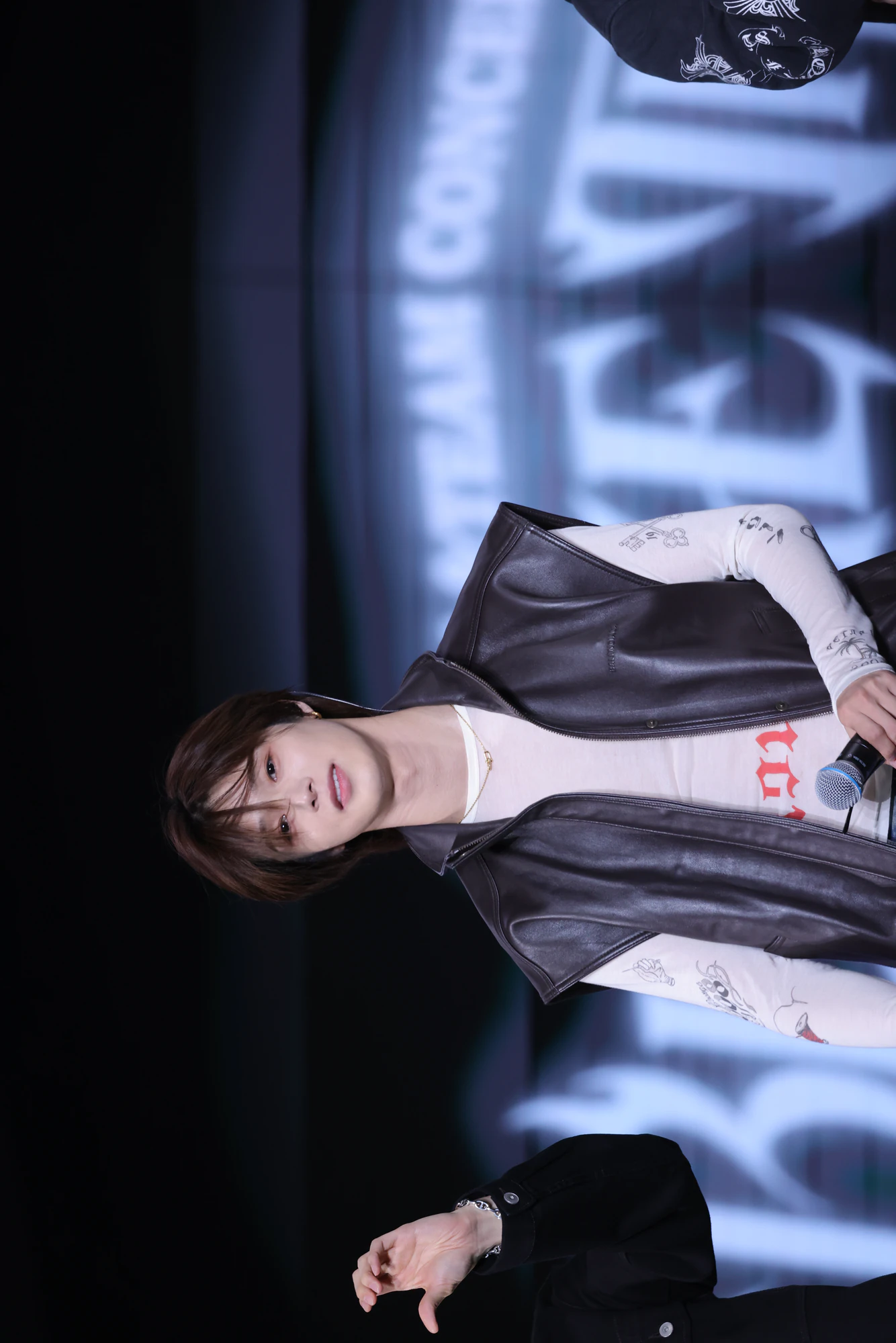 K performing on stage during a live performance.