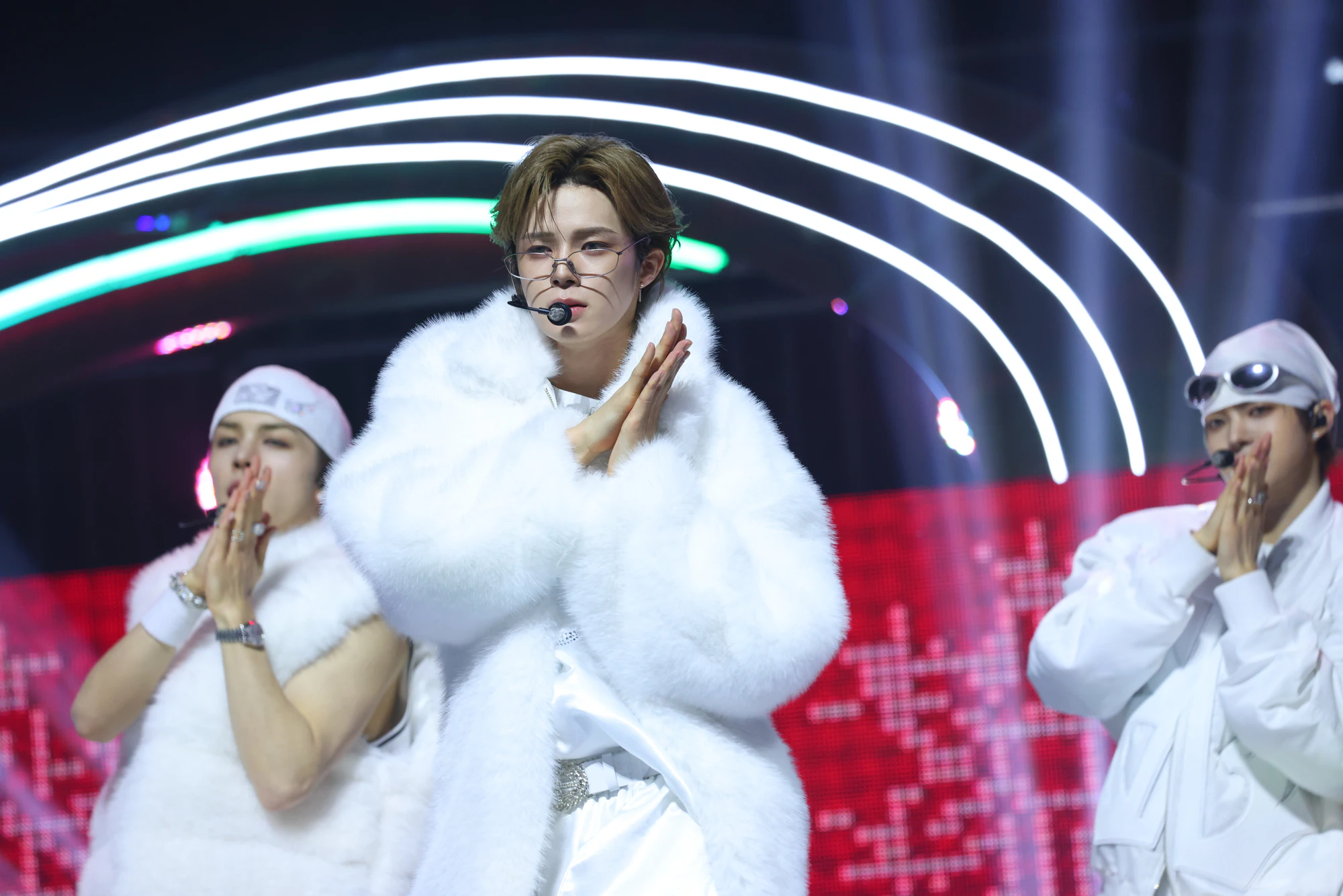 K performing on stage during a live performance.