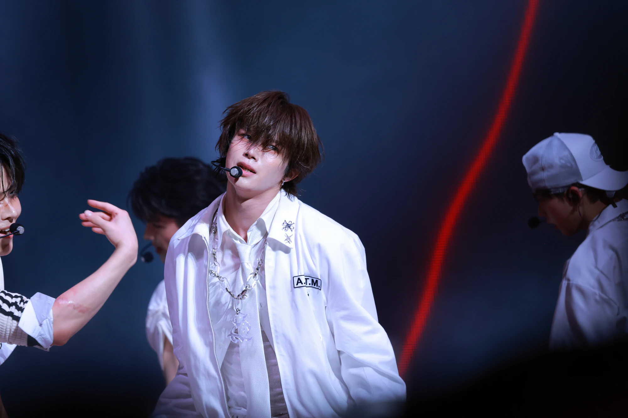 K performing on stage during a live performance.